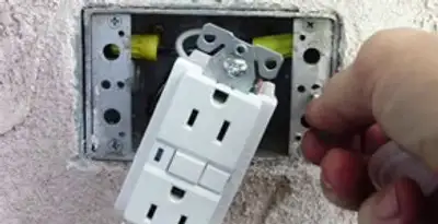 gfci circuits service showing installation of a ground fault circuit interrupter outlet by licensed electricians in Memphis, TN