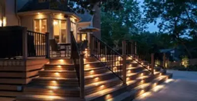 Residential electrician installing outdoor lighting for home safety in Memphis, TN
